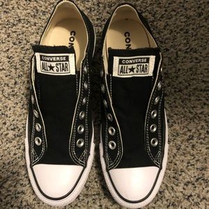 New Converse  women’s size 7.5.
